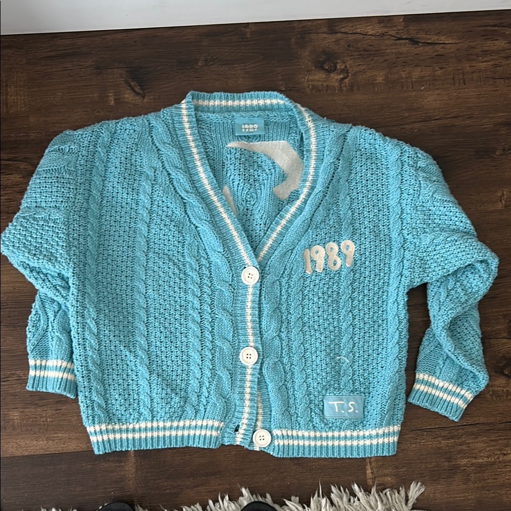 TAYLOR SWIFT brand 1989 Women's Blue Cable Knit Sweater